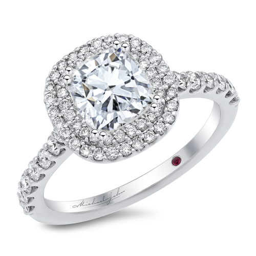 Diamond halo engagement ring with a total of carat round cut diamonds set into a double halo setting