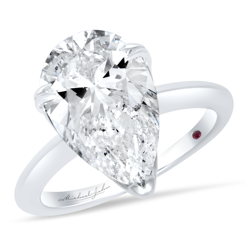 18K gold solitaire diamond engagement ring shown with 5.50 carat pear cut diamond