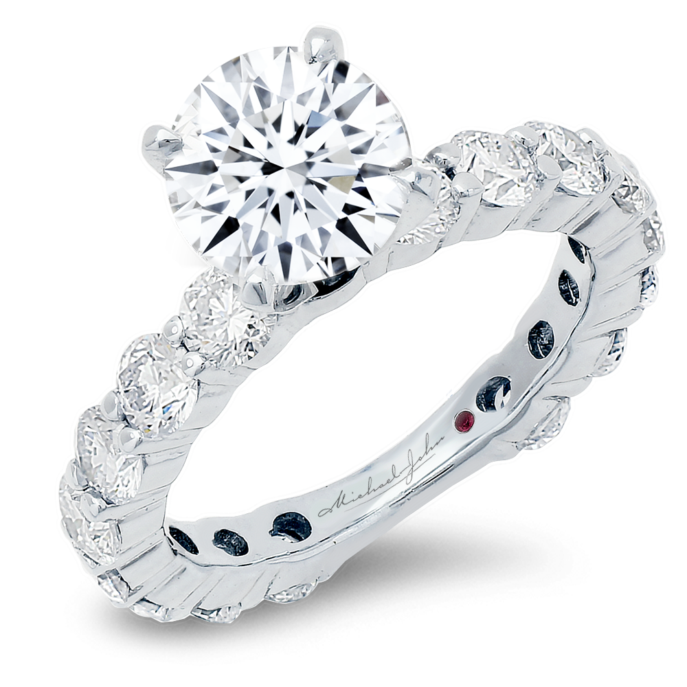 Diamond engagement ring with a total of 2.40 carat round cut diamonds on the sides, artistically set in an 18K white gold setting
