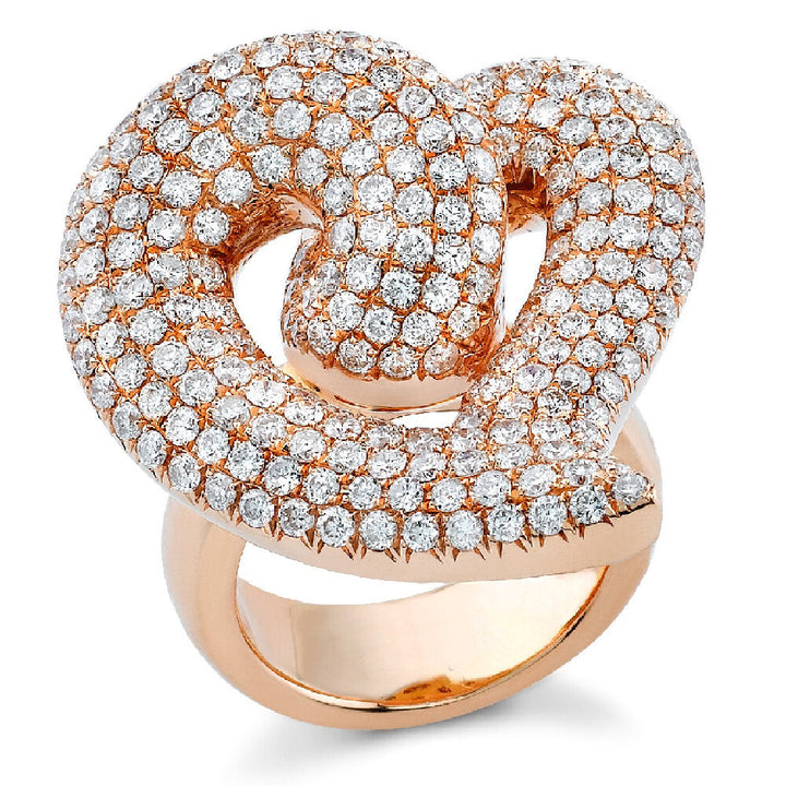 A ring of diamonds and 18K rose gold in a heart shape