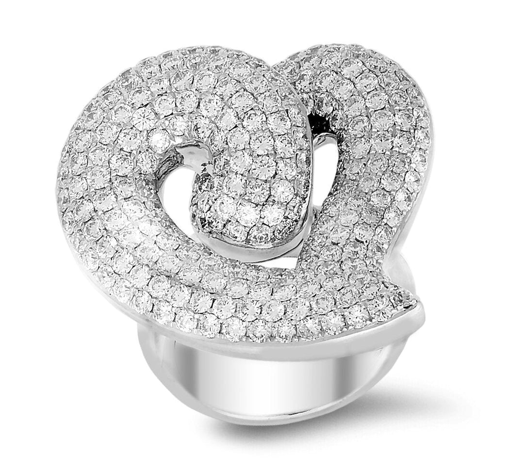 A ring of diamonds and 18K rose gold in a heart shape