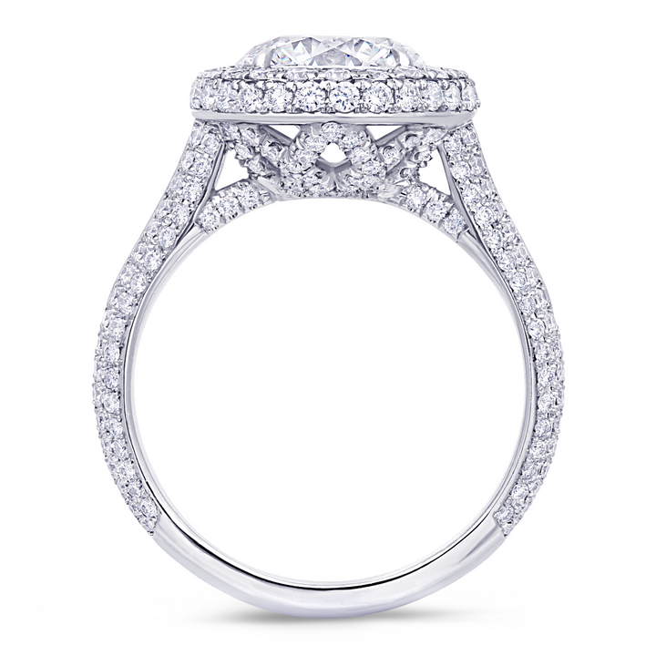 Unique pave style diamond engagement ring handcrafted in 18K white gold with a total of 1.20 carat round brilliant cut diamonds