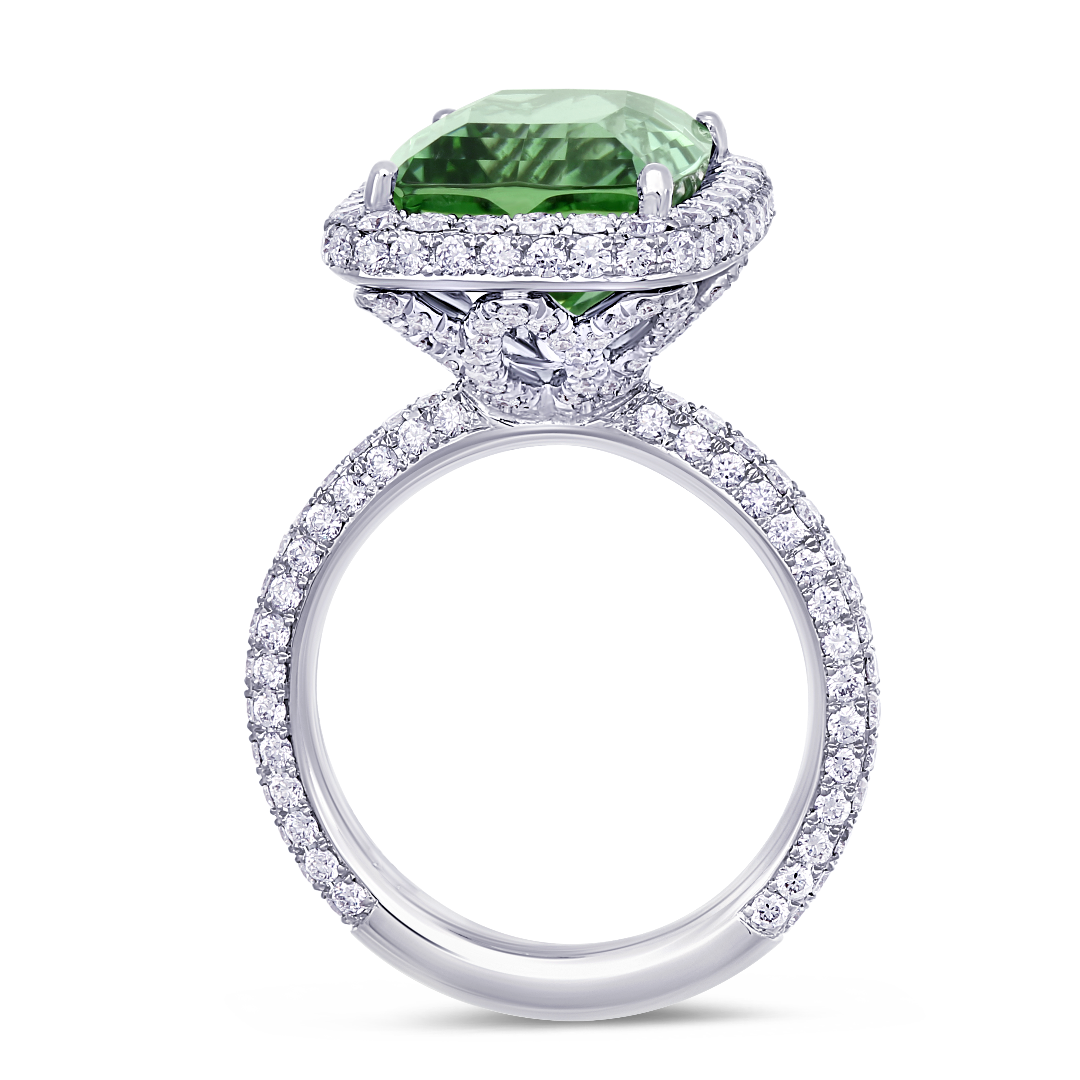 Handcrafted 18K white gold ring with a striking tourmaline centerpiece and diamond accents