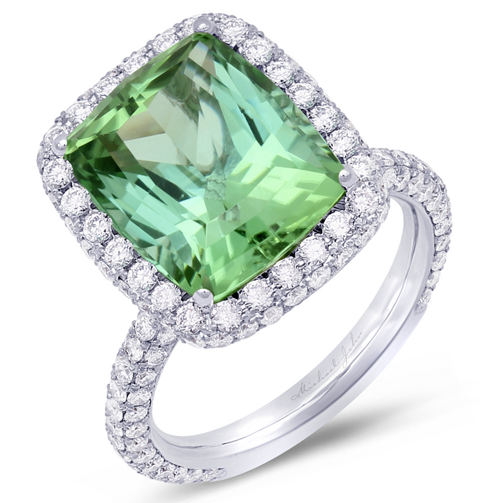 Handcrafted 18K white gold ring with a striking tourmaline centerpiece and diamond accents
