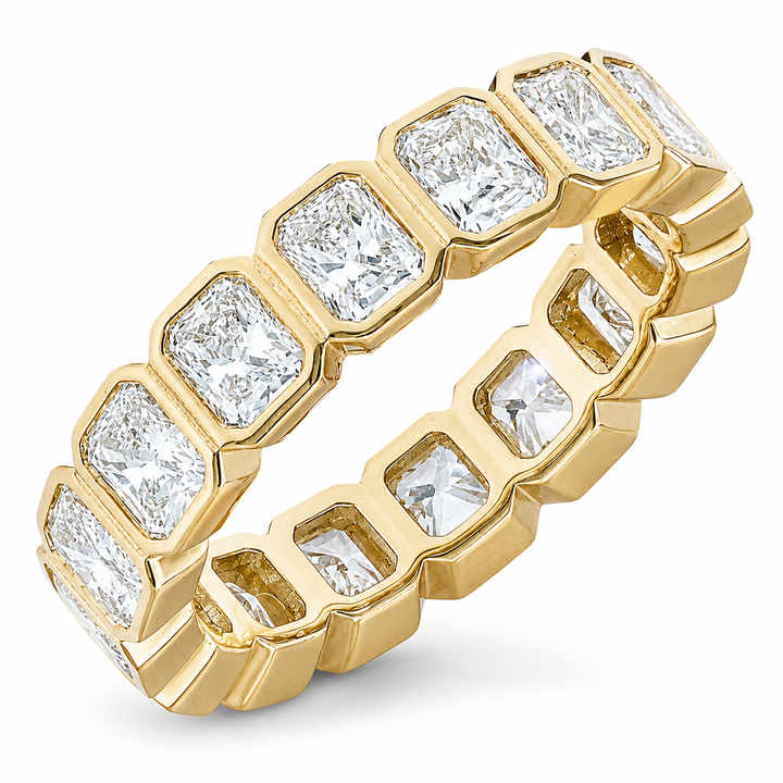 Cushion cut diamond eternity band set in an 18K gold band