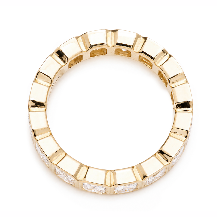 Cushion cut diamond eternity band set in an 18K gold band