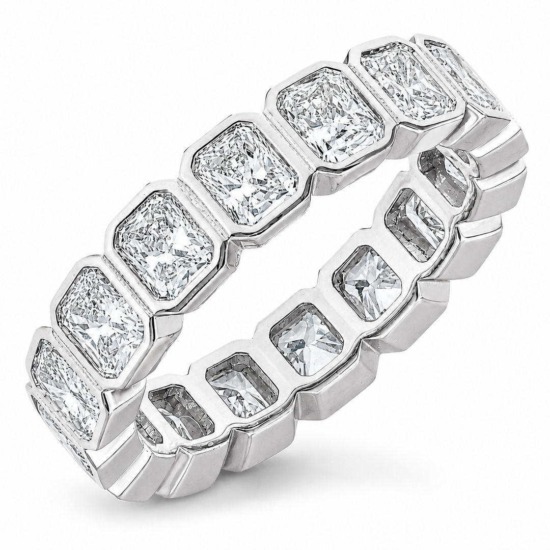 Cushion cut diamond eternity band set in an 18K gold band