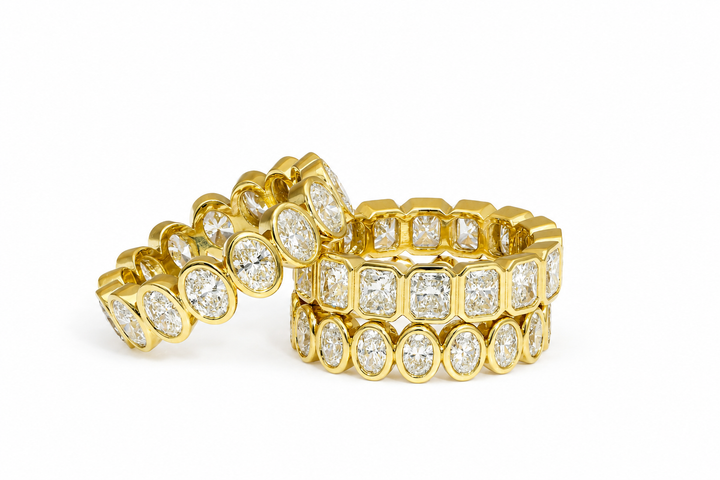 Cushion cut diamond eternity band set in an 18K gold band