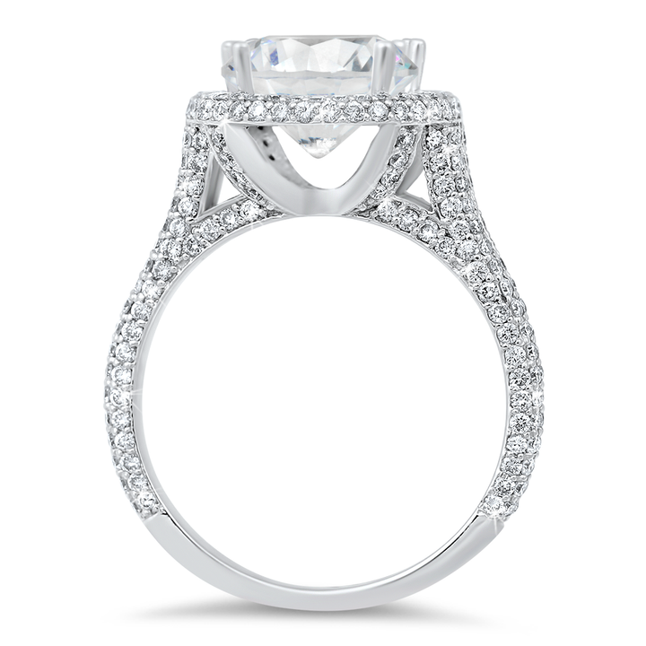 Pave diamond halo engagement ring with a total of 1.10 carat round cut diamonds on an 18K white gold setting