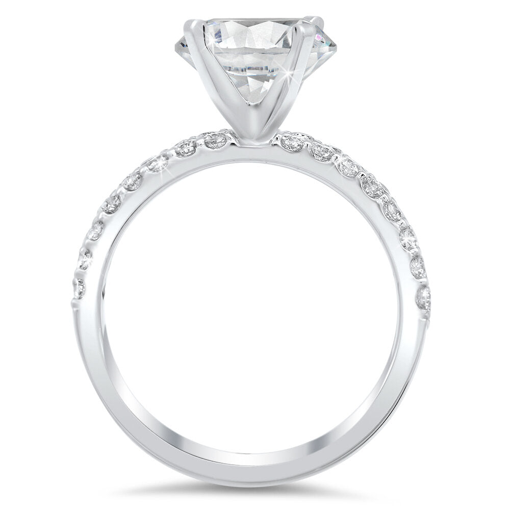 Diamond engagement ring and the matching band with a total of 0.75 carat round cut diamonds set into an 18K white gold setting