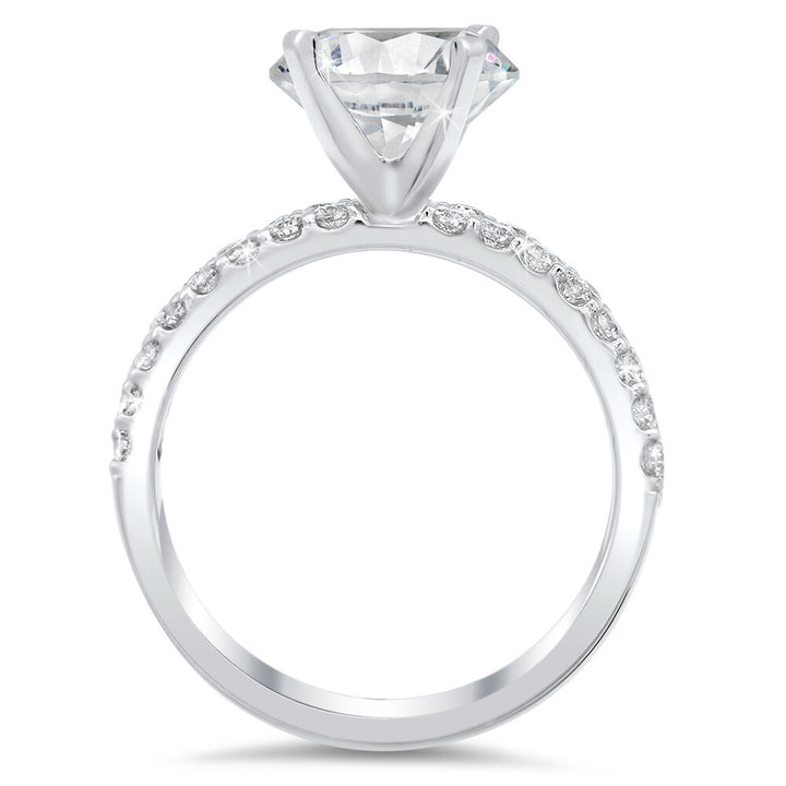 Diamond engagement ring and the matching band with a total of 0.75 carat round cut diamonds set into an 18K white gold setting