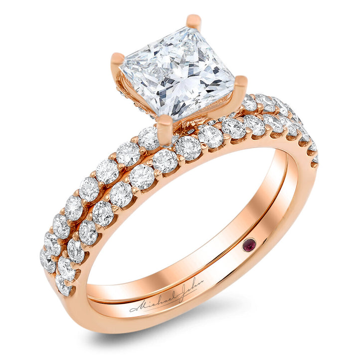 Diamond engagement ring and a matching diamond band with a total of 0.75 carat round cut diamonds set on an 18K rose gold prong style setting