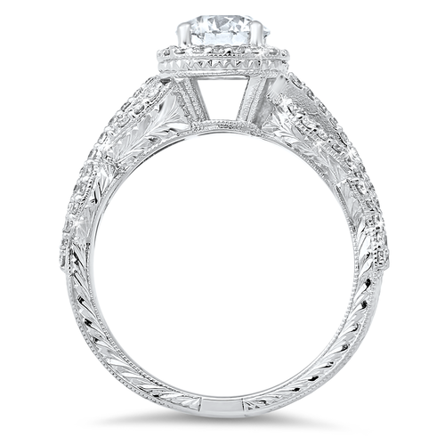 Vintage-inspired diamond engagement ring with a total of 0.50 carat round cut diamonds set on a floral 18K white gold shank