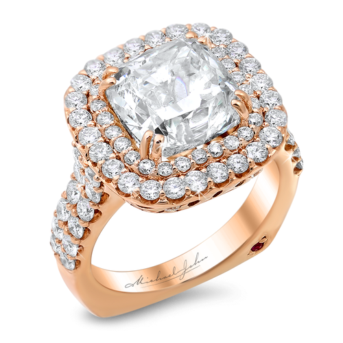 Double halo diamond engagement ring with a total of 1.10 carat round cut diamonds set into an 18K rose gold setting