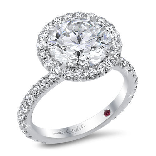 Diamond halo engagement ring with total of 1.10 carat round cut diamonds set in an 18K white gold setting