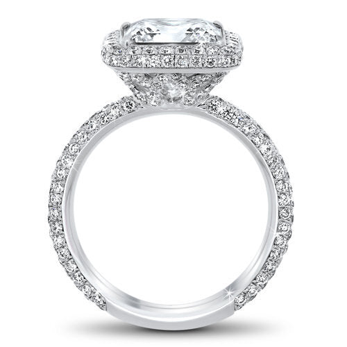 Diamond halo engagement ring with a total of 1.00 carat round cut pave set diamonds on an 18K white gold setting