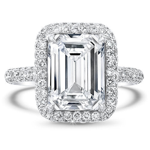 Diamond halo pave set engagement ring with a total of 1.20 carat round cut diamonds set in an 18K white gold setting